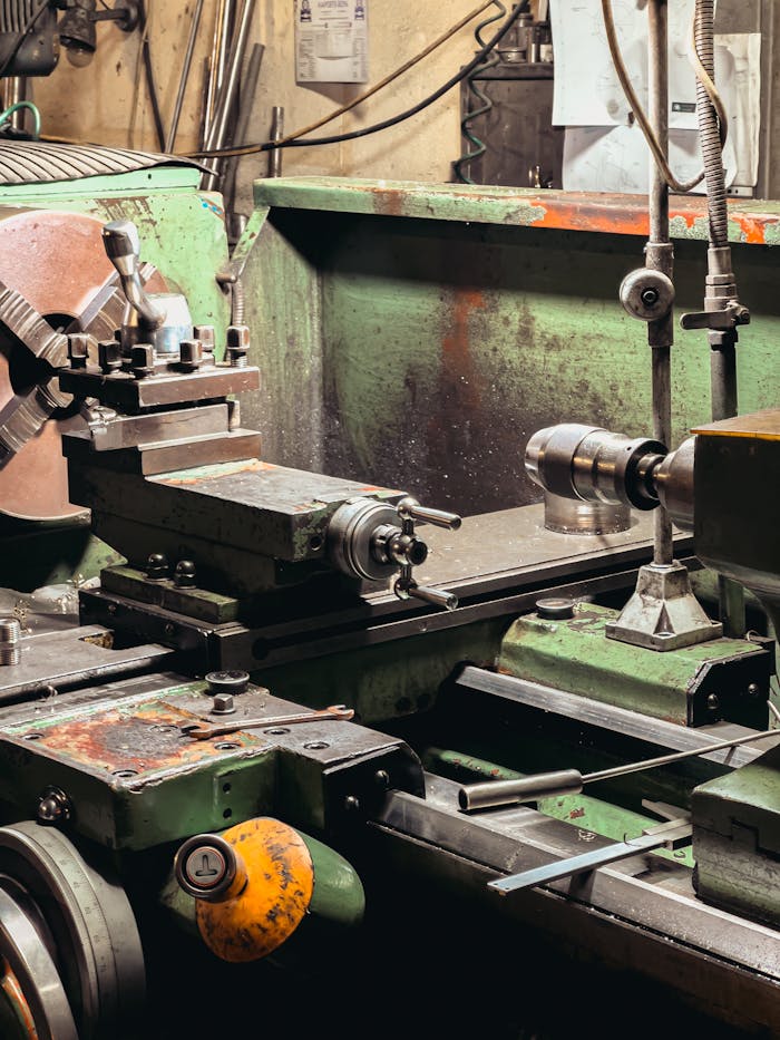 Crafting Captivating Headlines: Your awesome post title goes here Close-up of a metal lathe in an industrial workshop setting.